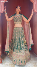 Load and play video in Gallery viewer, Emerald Green/Pink Bridal Lehenga

