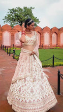 Load and play video in Gallery viewer, Belted Light Cream/Pink Bridal Lehenga

